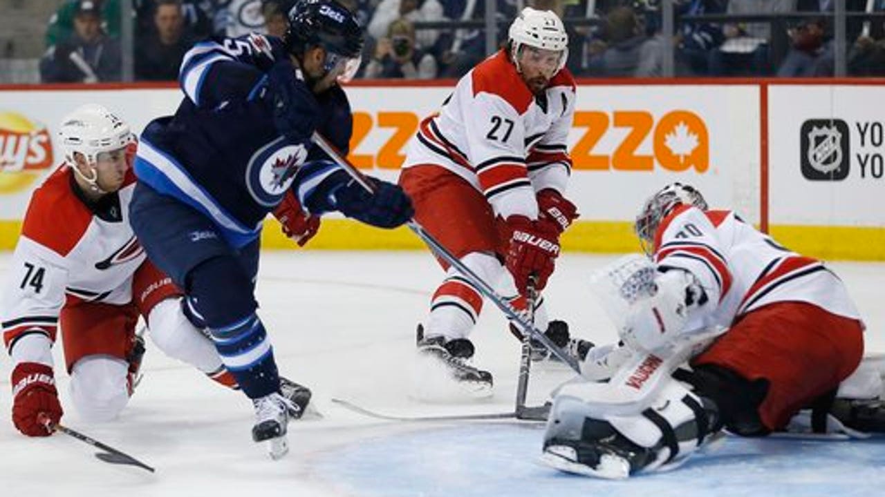 Mark Scheifele scores in OT, Jets beat Hurricanes 5-4